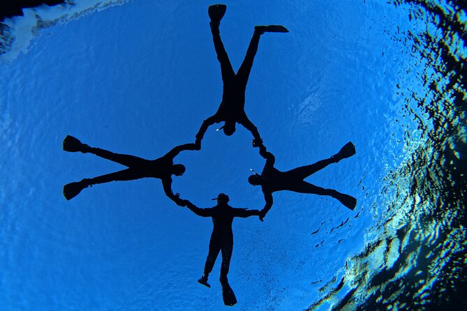 Snorkel the Silfra Fissure-Meet on Location (Free Photos & Cocoa) - Swimming through the gap at Silfra