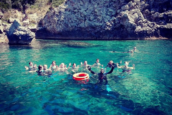 Snorkeling Tour Coast to Coast Taormina and Isola Bella - Leaving Giardini Naxos with Etna behind you