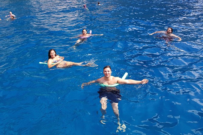 Sorrento: Capri Select Boat Trip with Swim, Drinks & Pick Up - The coast, Punta Campanella, and the first views