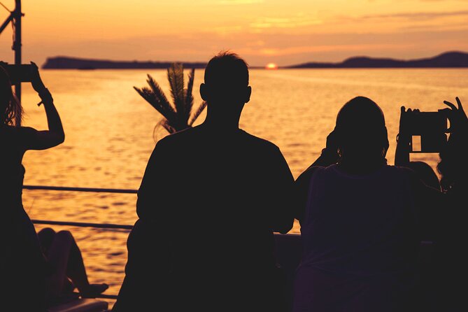 Sunset Beach Hopping Cruise, Cala Comte and Cala Bassa, SUP and snorkelling - Sunset from the water is the payoff