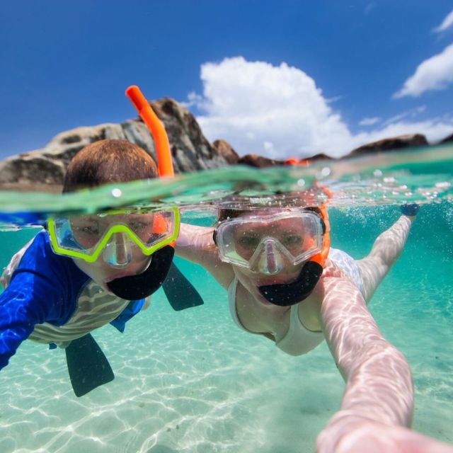 Tavolara, Snorkeling in the Marine Park - Tavolara Island and its imposing rock wall
