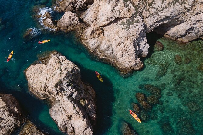 Tossa de Mar: Kayak & Snorkel Tour with Paella from Barcelona - Key points at a glance