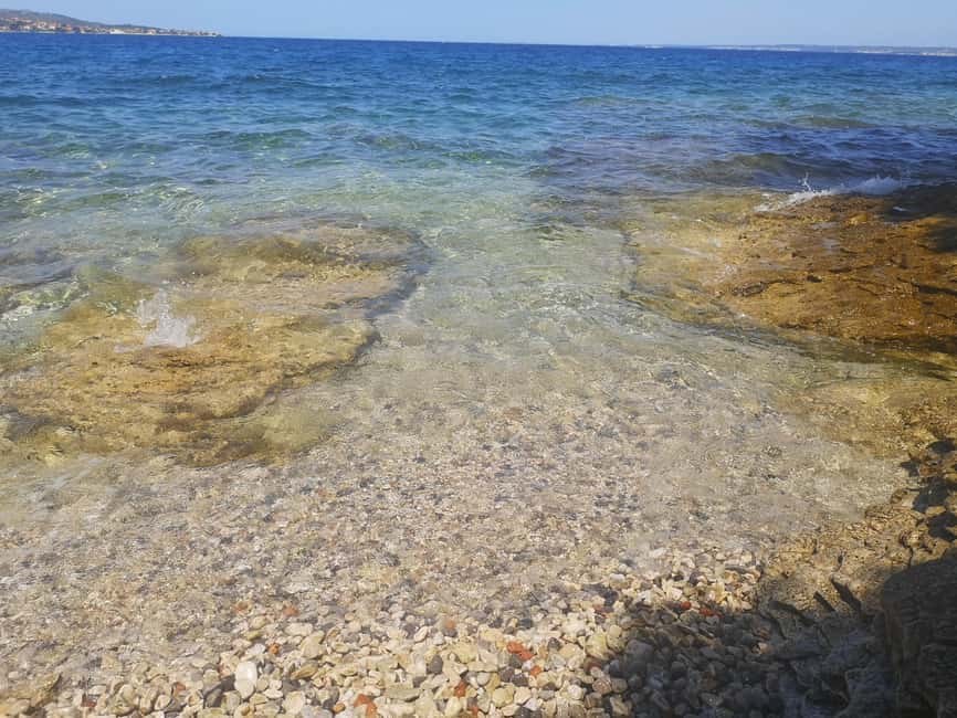 Zadar: 3-Stop Blue Lagoon & Snorkeling Cruise with Drinks - What the skipper adds to the day